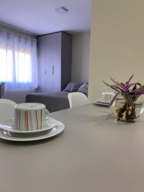 Loft central com garagem